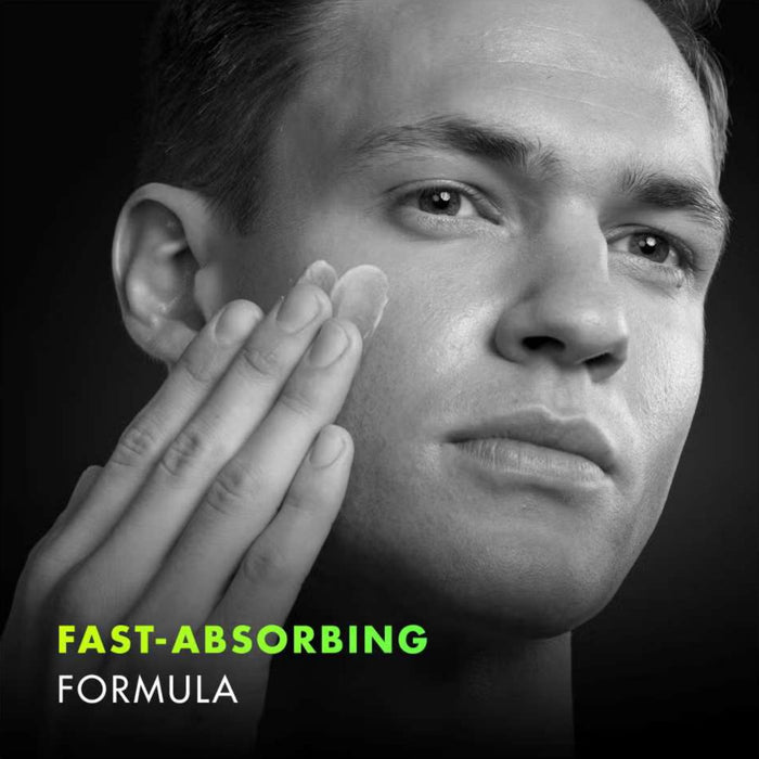 Man applying Gillette Labs Fast Absorbing Moisturiser to his face, black background, text reads "Fast-Absorbing Formula"