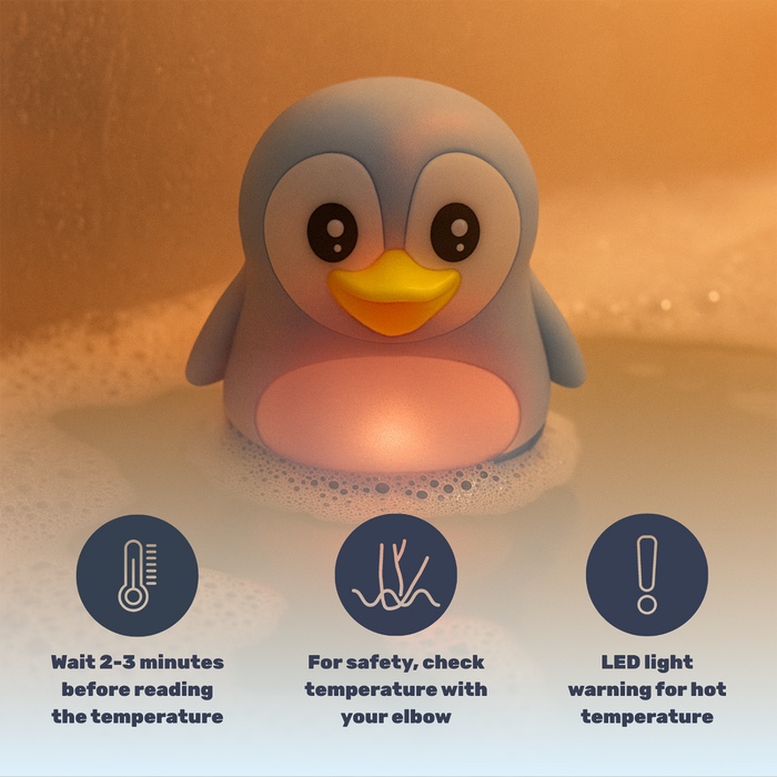 TensCare Digi Penguin Bath Thermometer floating in bubbly water on warm orange background, glowing pink belly, with usage tip icons below.