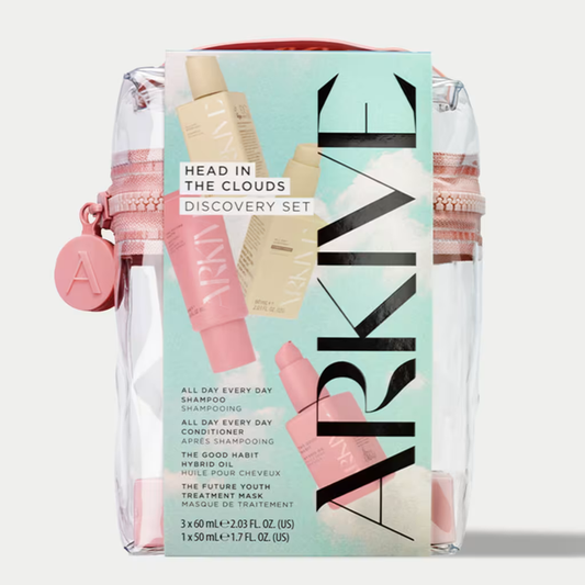 Arkive Head In The Clouds Discovery Set in clear pink zip bag on grey background, showing shampoo, conditioner, hybrid oil and mask products