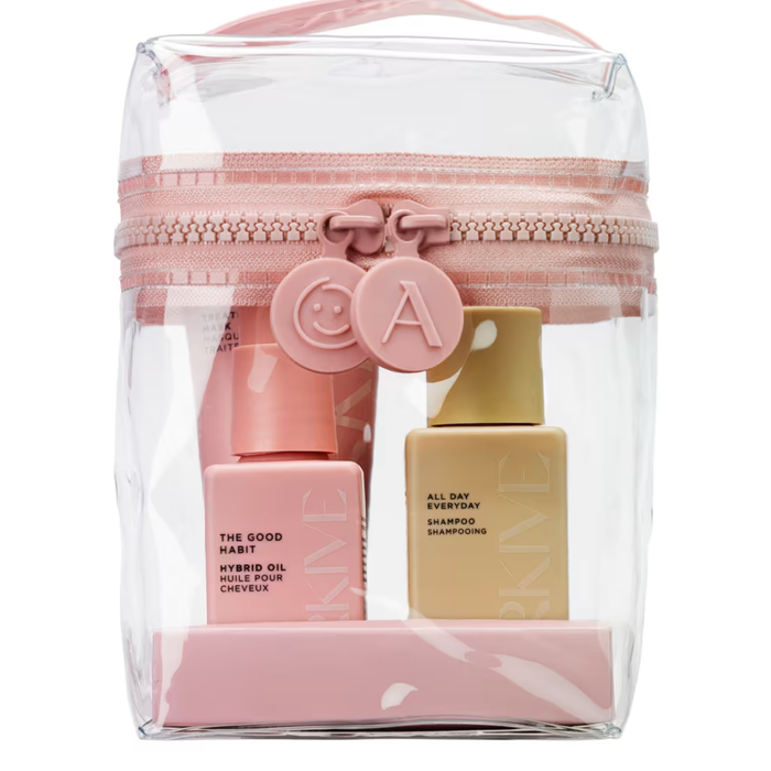 Arkive Head In The Clouds 5 Piece Set in clear pink-zipped bag with The Good Habit Hybrid Oil and All Day Everyday Shampoo on white background