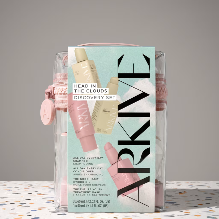 Arkive Head In The Clouds Discovery Set box with clear pink zip bag on grey background, showing shampoo, conditioner, oil and mask