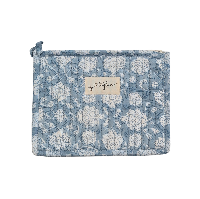 Floral patterned pouch with a visible brand label on a white background