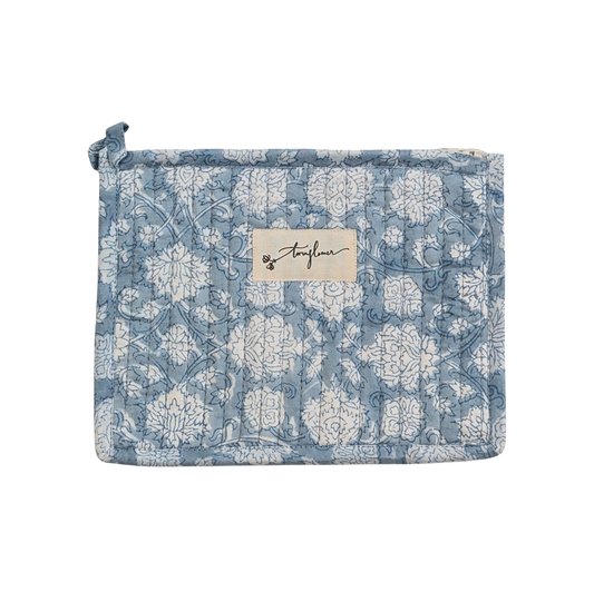 Floral patterned pouch with a visible brand label on a white background