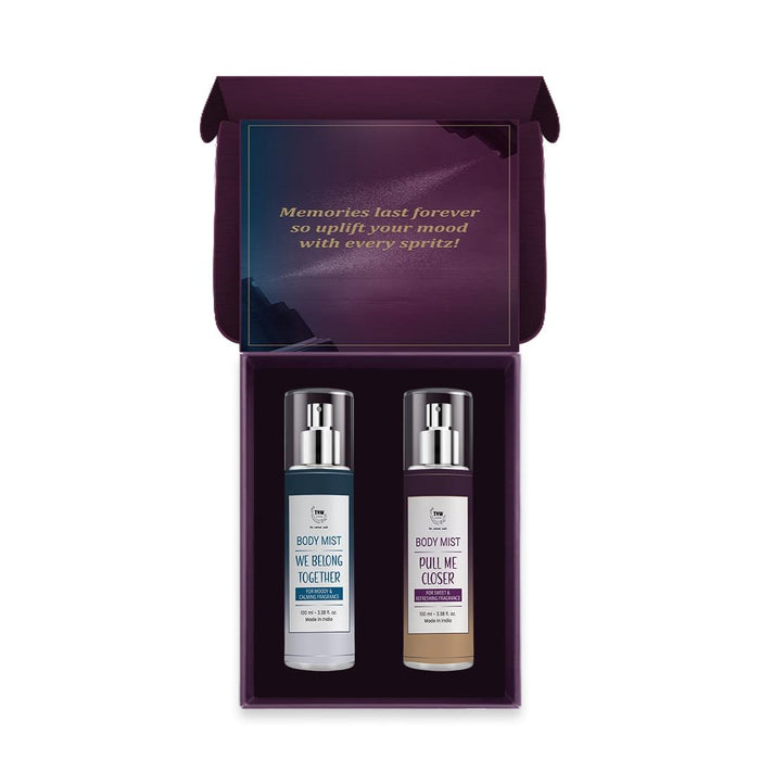 A gift pack containing two bottles of body mist, one labeled 'Pull Me Closer' and the other 'We Belong Together', placed inside a purple box with the text 'Memories last forever so uplift your mood with every spray!'.