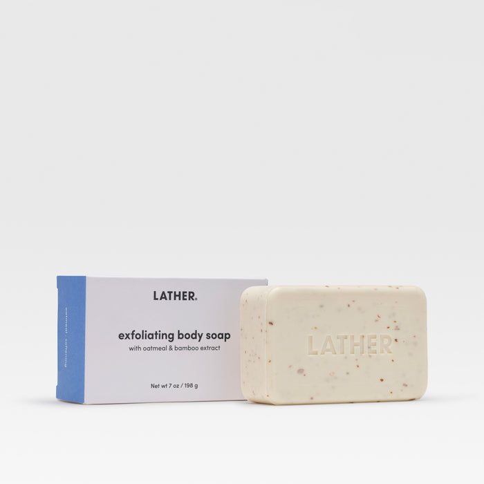 Bar of exfoliating body soap with packaging labeled 'LATHER' on a white background