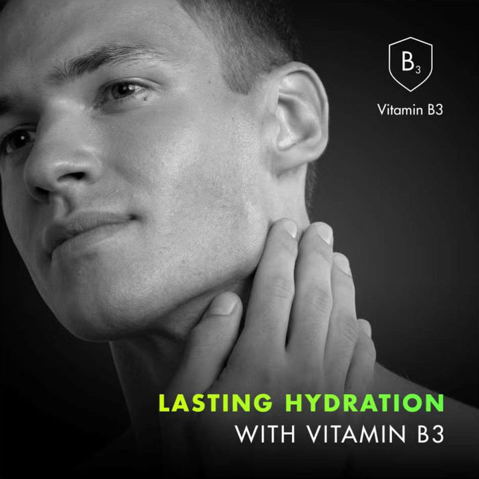 Man applying Gillette Labs Fast Absorbing Moisturiser to face on dark background. Text reads "Lasting Hydration with Vitamin B3"