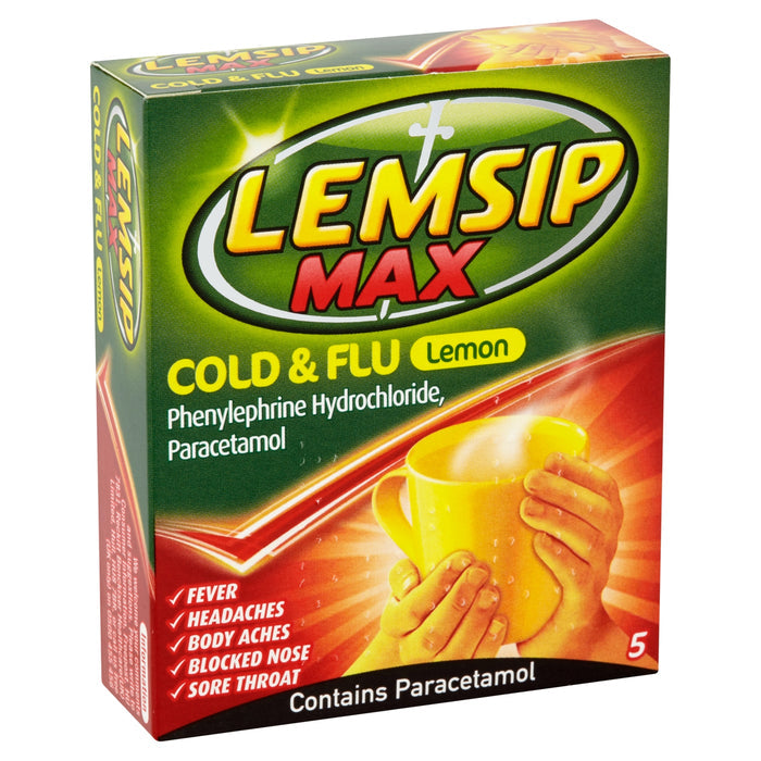 Lemsip Max Cold & Flu Lemon sachets box, green and red, showing hot drink held in hands, lists fever, headaches, body aches, blocked nose, sore throat. 5 sachets.