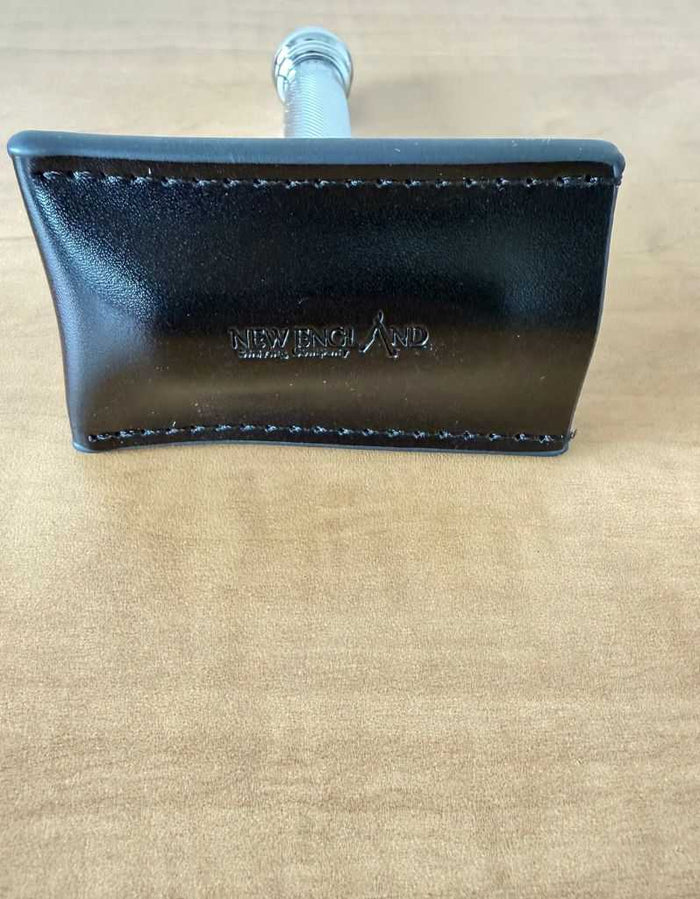 Razor head cover with razor inside, black leather