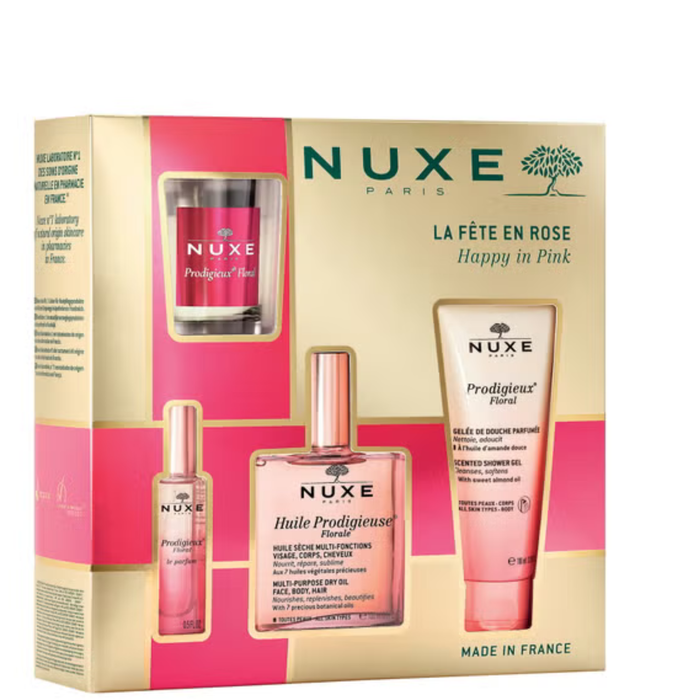 Nuxe Happy In Pink gift set box in gold and pink showing Huile Prodigieuse Florale oil, parfum, shower gel and candle.