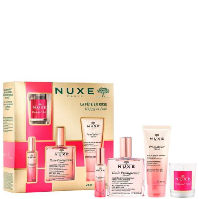 Nuxe Happy In Pink 4 Piece Gift Set box with Huile Prodigieuse Florale oil, shower gel and candle on white background