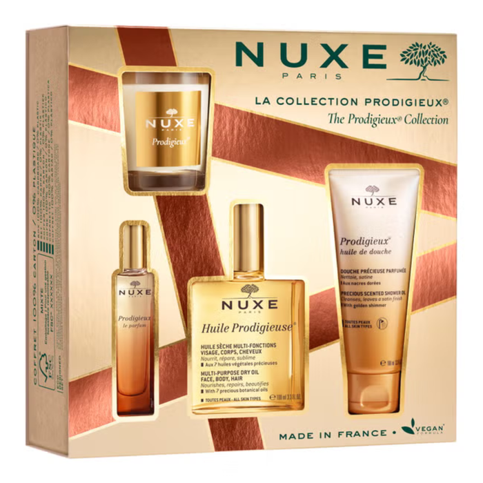 Nuxe Prodigieux 4 Piece Gift Set in gold box with dry oil, shower oil, perfume and candle on white background