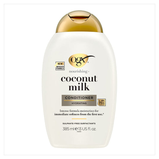 OGX Nourishing+ Coconut Milk Conditioner 385ml white bottle with gold cap on white background, labelled hydrating, sulphate-free surfactants