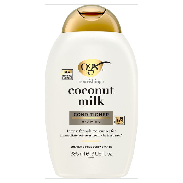 OGX Nourishing+ Coconut Milk Conditioner 385ml white bottle with gold cap on white background, labelled hydrating, sulphate-free surfactants.