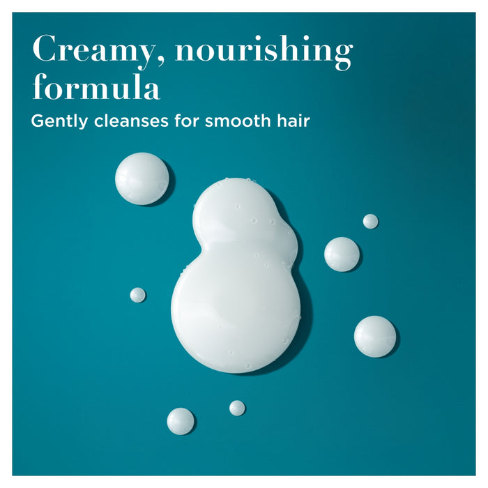 OGX Coconut Milk Shampoo white creamy formula droplets on teal background, text reads "Creamy, nourishing formula, gently cleanses for smooth hair"