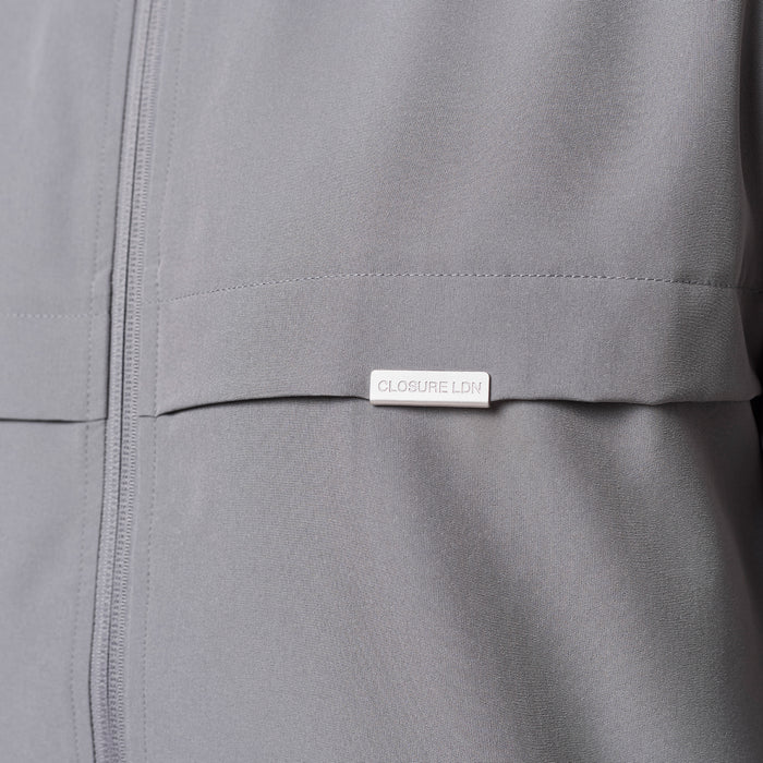 Premium Performance Jacket in grey– Closure LDN branded tab detail