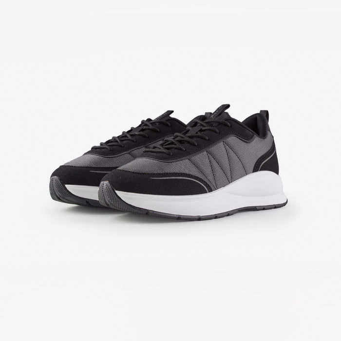Pair of smart runners in black shot on white background