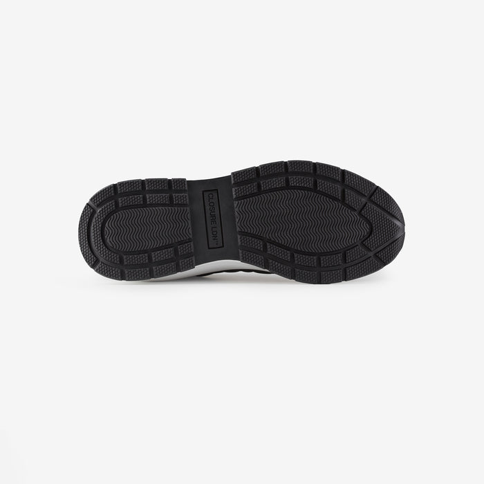 Bottom of smart runner shoe showing black sole