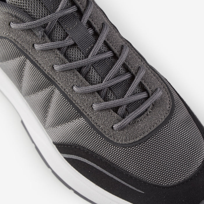 Close up shot of smart runner trainer in charcoal showing mesh detailing