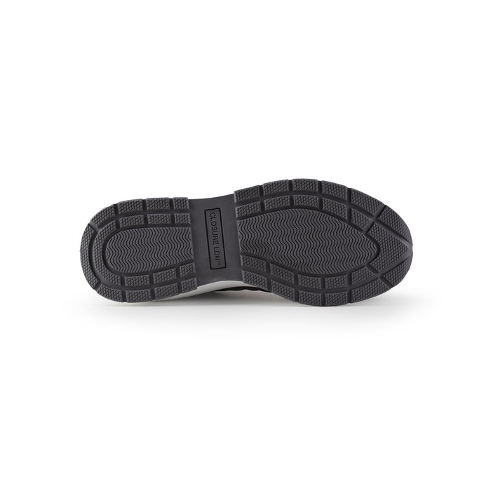 Bottom of smart runner trainer showing grey sole