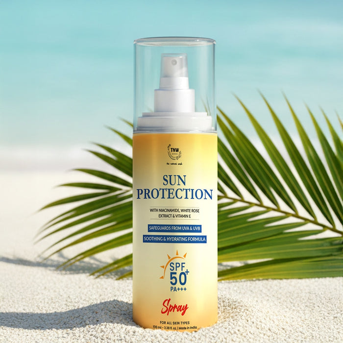 Sun protection spray bottle with palm leaves in the background
