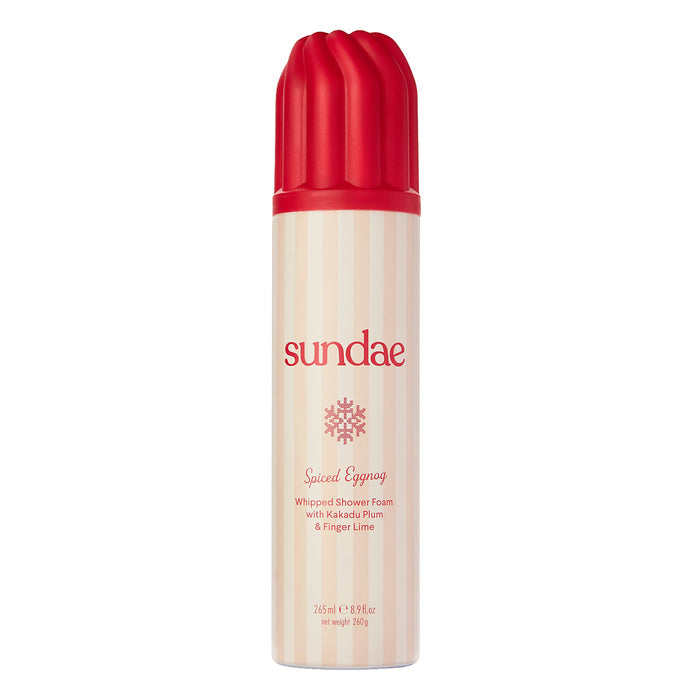 Sundae Egg Nog Shower Foam 265ml can with red ribbed cap, cream stripe label reading "Spiced Eggnog Whipped Shower Foam" on white background.