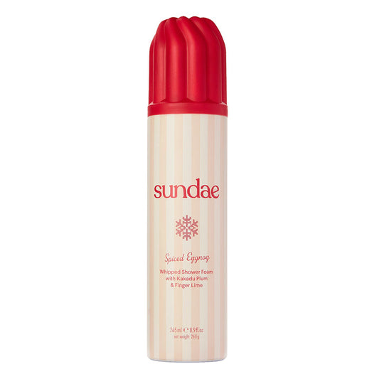 Sundae Egg Nog Shower Foam 265ml can with red ribbed cap, cream stripe label reading "Spiced Eggnog Whipped Shower Foam" on white background.