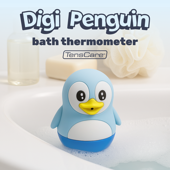 TensCare Digi Penguin bath thermometer, blue penguin-shaped device on white bath edge, light blue background with soap and loofah