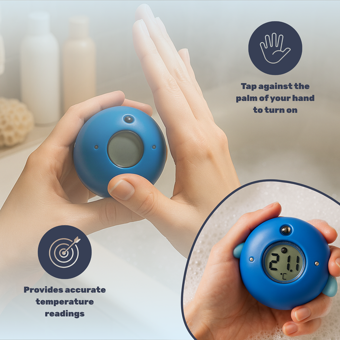 TensCare Digi Penguin Bath Thermometer held in hands showing 21.1°C on LCD display, light grey background