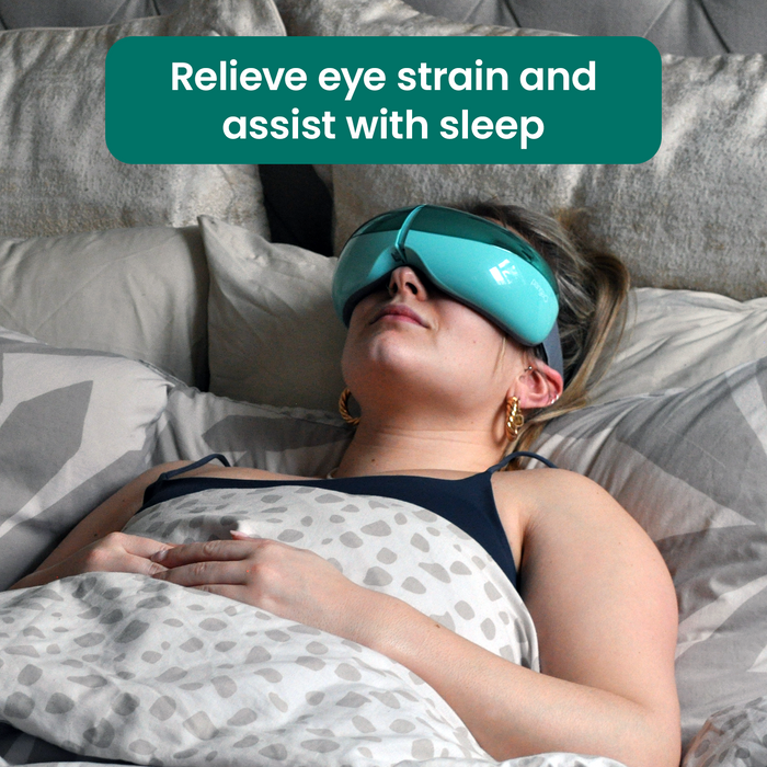 Woman lying on grey bedding wearing teal TensCare OKO Eye Massager; text reads "Relieve eye strain and assist with sleep"