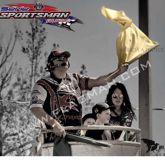 High visibility yellow racing flag for track officials
