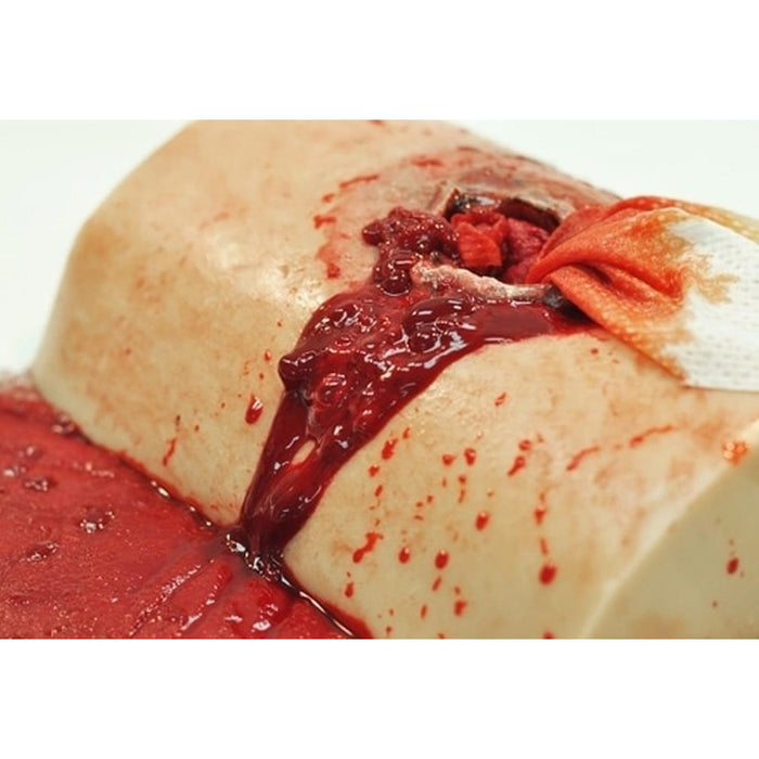 Blood Simulant, Pre-Mixed by TrueClot in use with wound packed for stop the bleed training