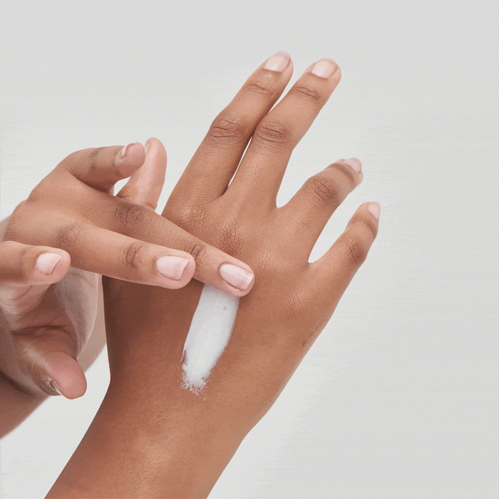 Vitamin C 30% applied to the back of a hand